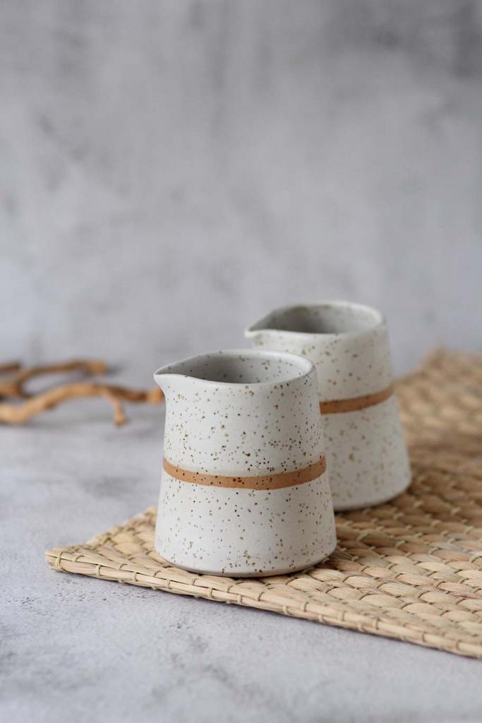 Молочник треугольный