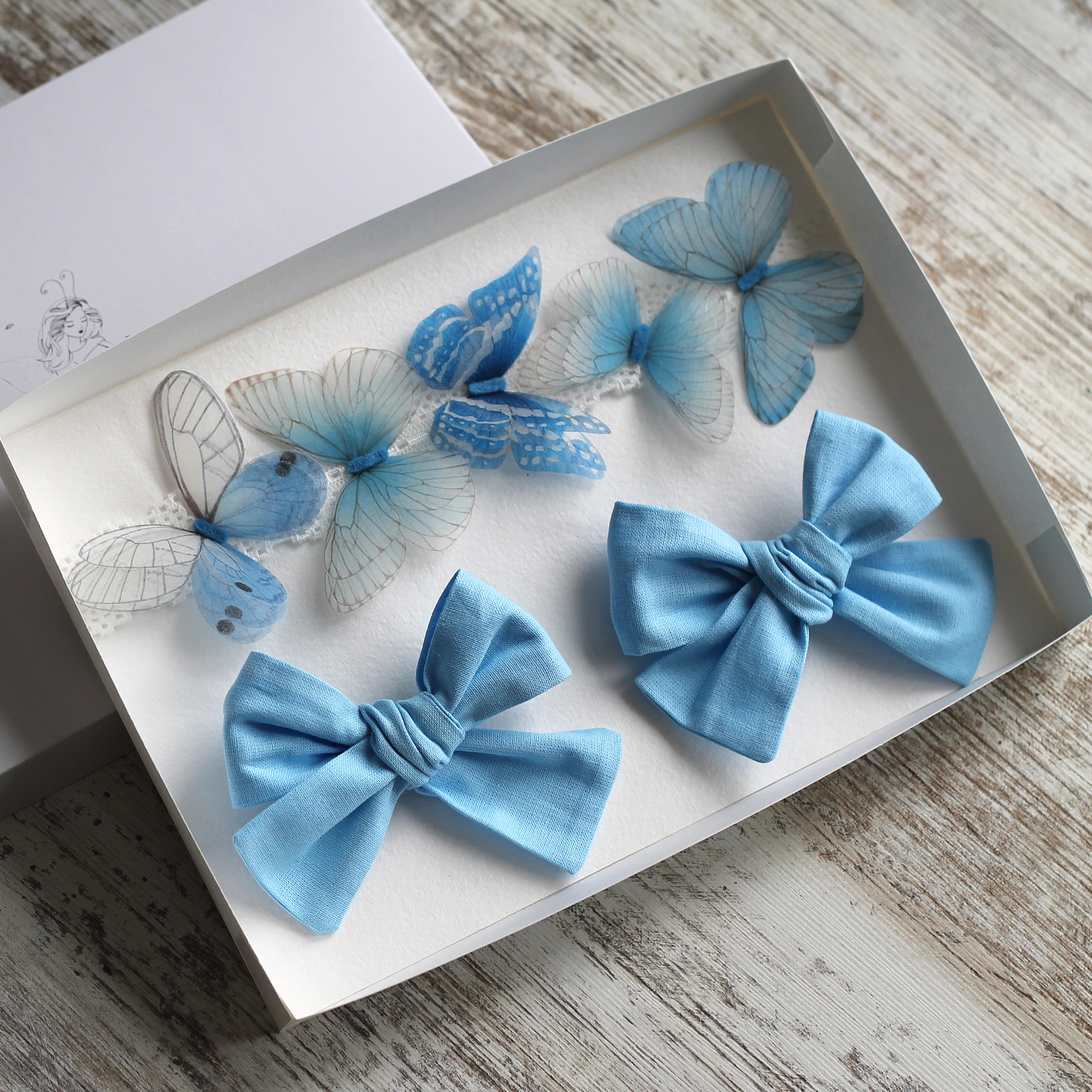 подарочный бокс заколок в голубой гамме