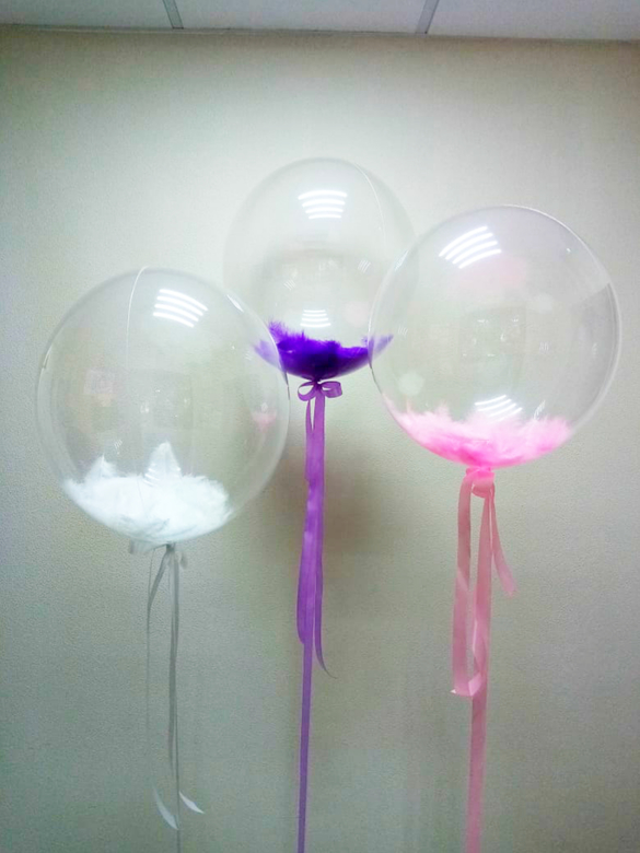 Три шара с перышками