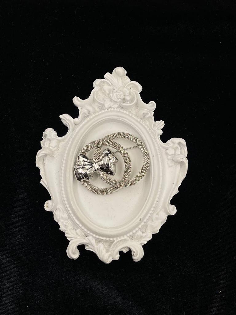 Винтажная брошь двойная с бантиком