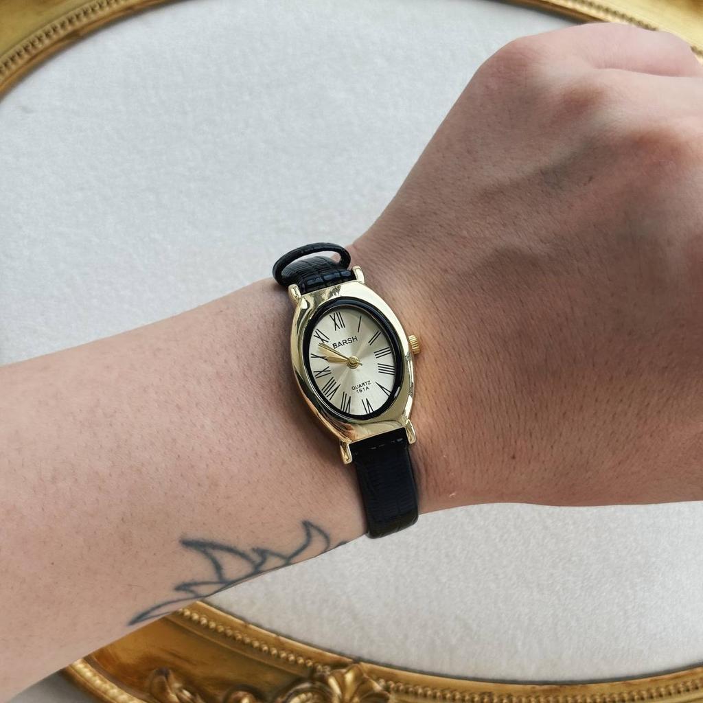 Часы "Oris" с золотистым циферблатом