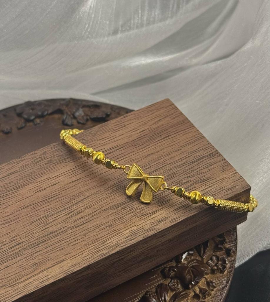 Браслет «Бантик золотистый»