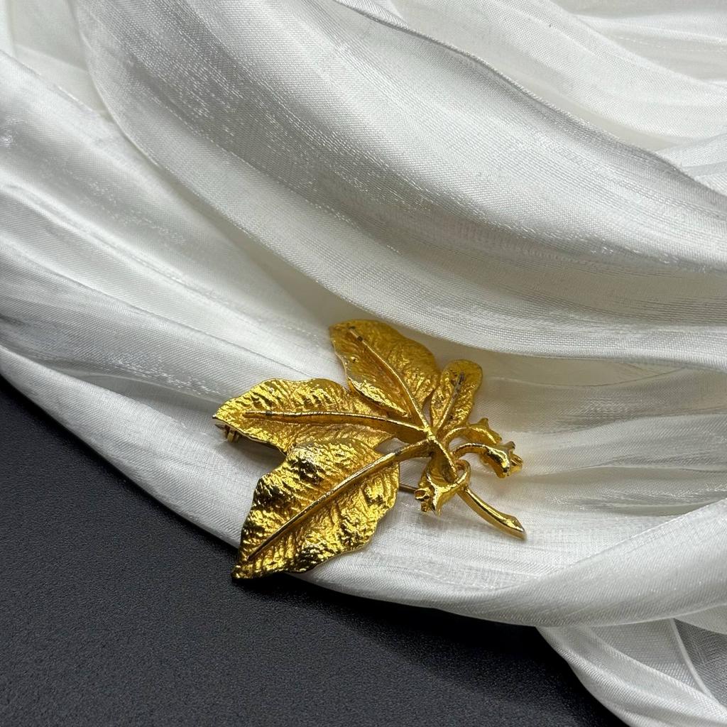 Винтажная брошь "Лик совершенства", США, 70е