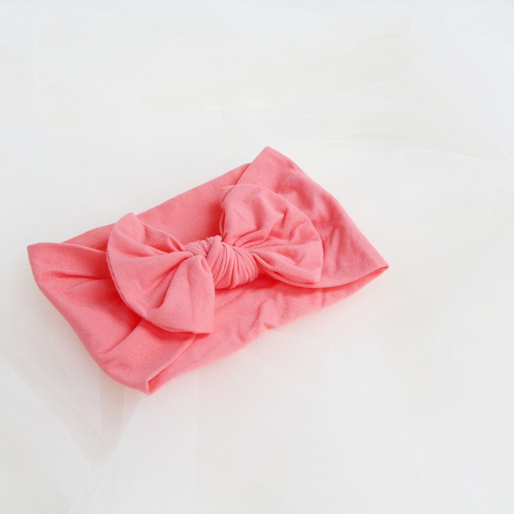 Повязка на голову "Широкий бант" коралловый