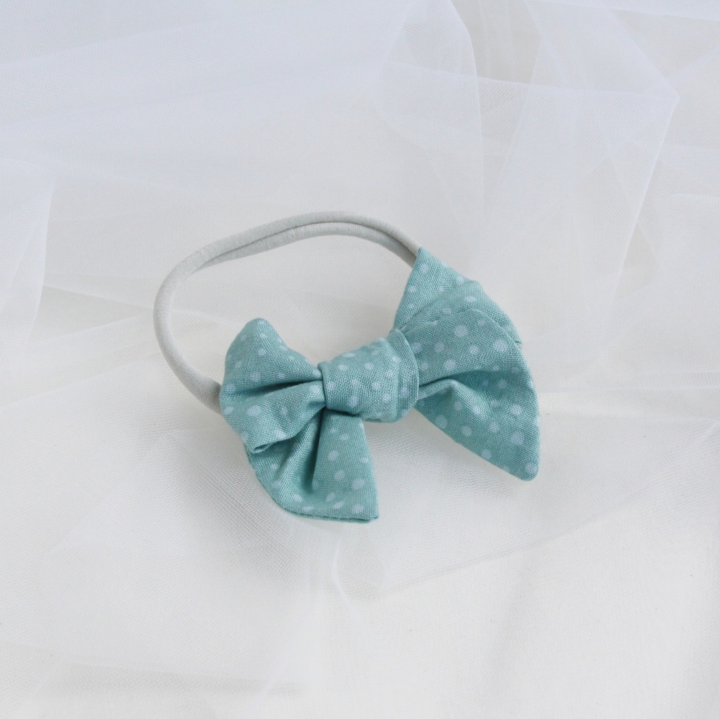 Повязка на голову "Хлопковый бант" цвет мятный в горошек