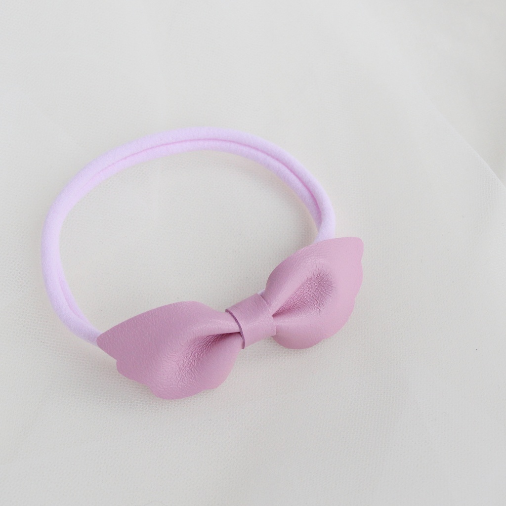 Повязка на голову "Кожаный бантик-крылья" розовый