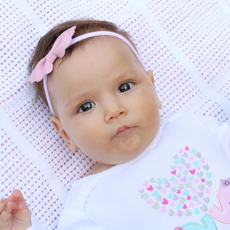 Повязка на голову "Кожаный бантик-крылья" розовый