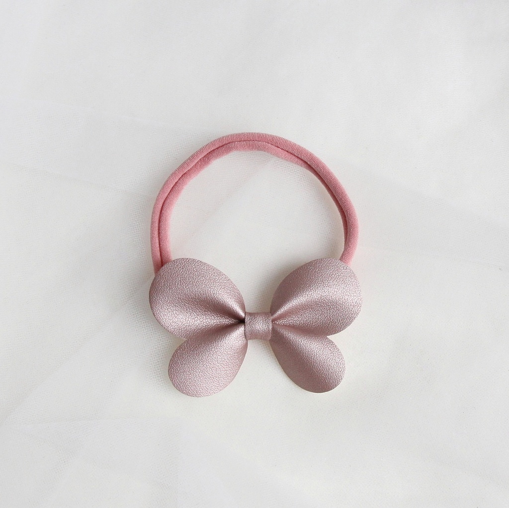 Повязка на голову "Бантик-бабочка" розовое золото