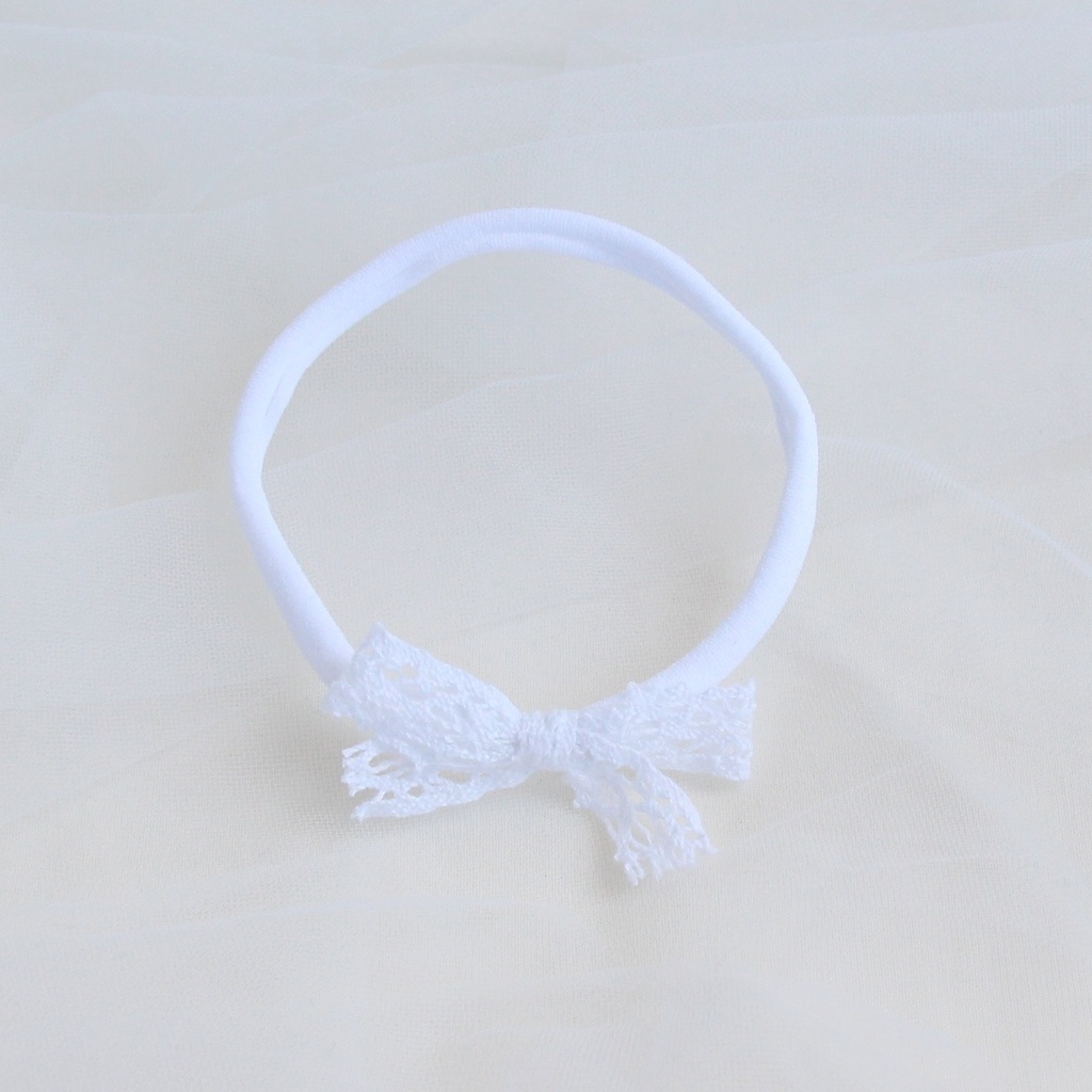 Повязка на голову "Кружевной бантик" белый