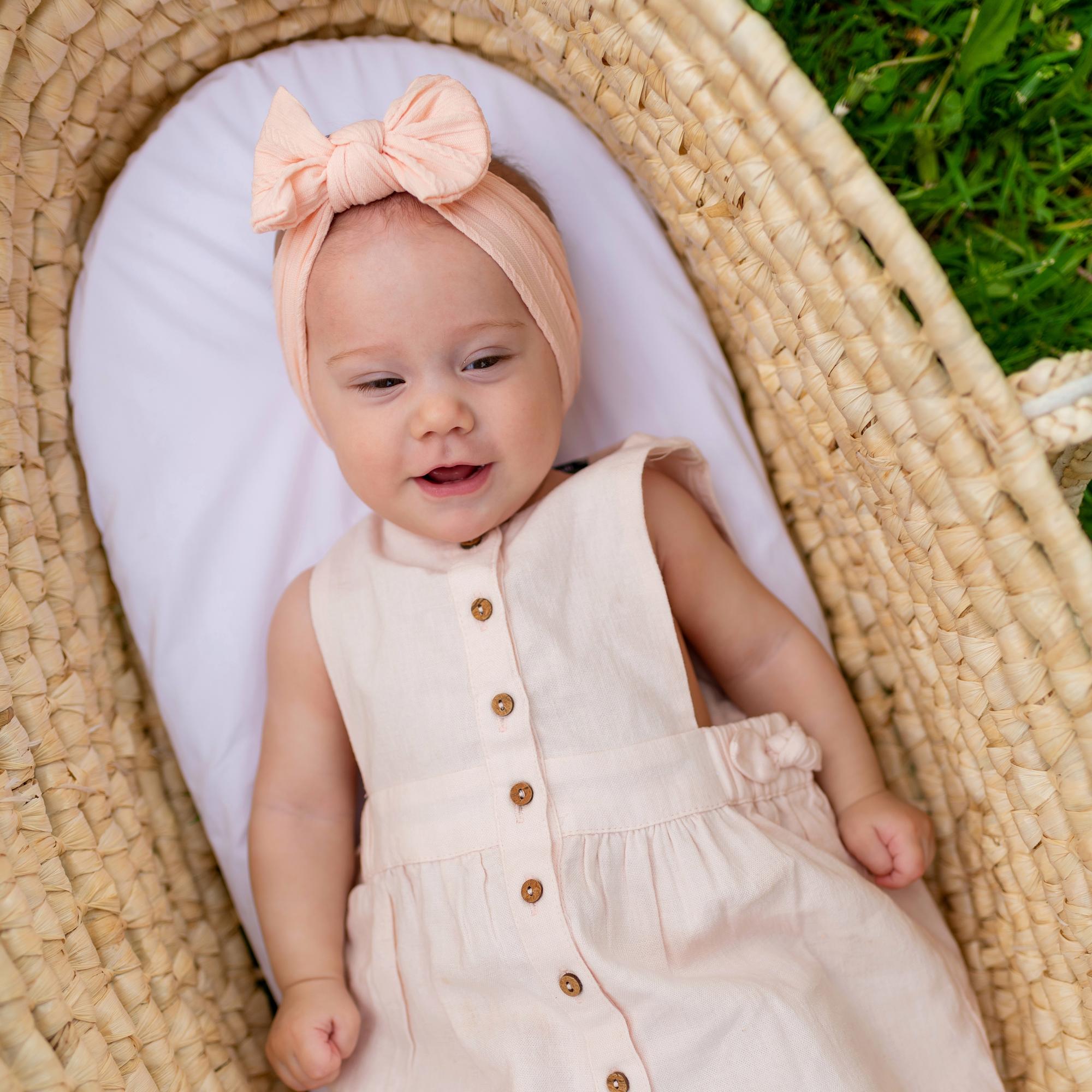 Повязка на голову "Широкий бант с узором" персиковый