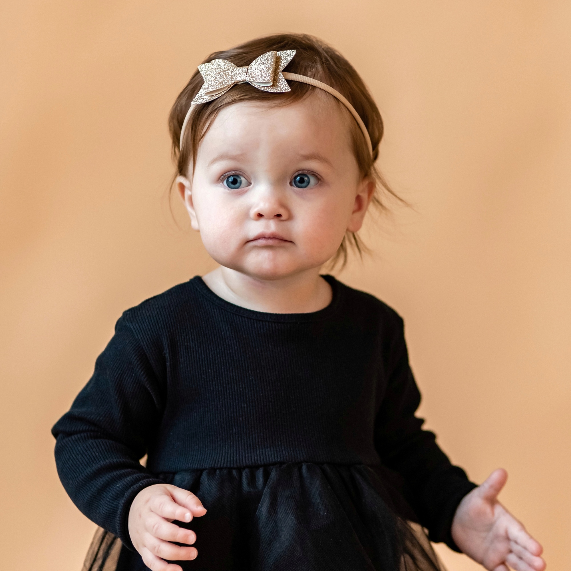 Повязка на голову "Блестящий бант" золотой