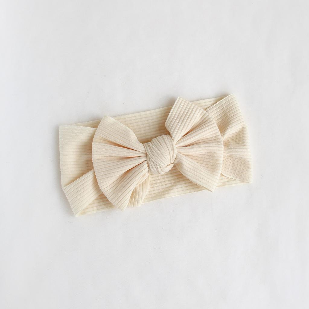 Повязка на голову до 6 месяцев "Широкий бант" ванильный