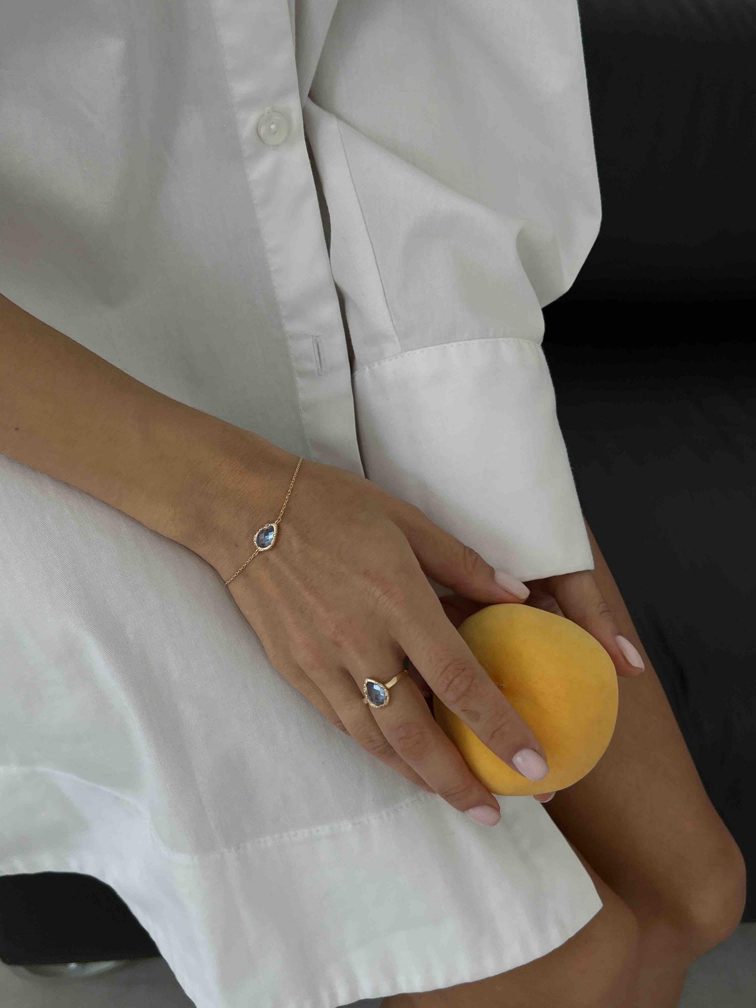 Кольцо с голубой каплей