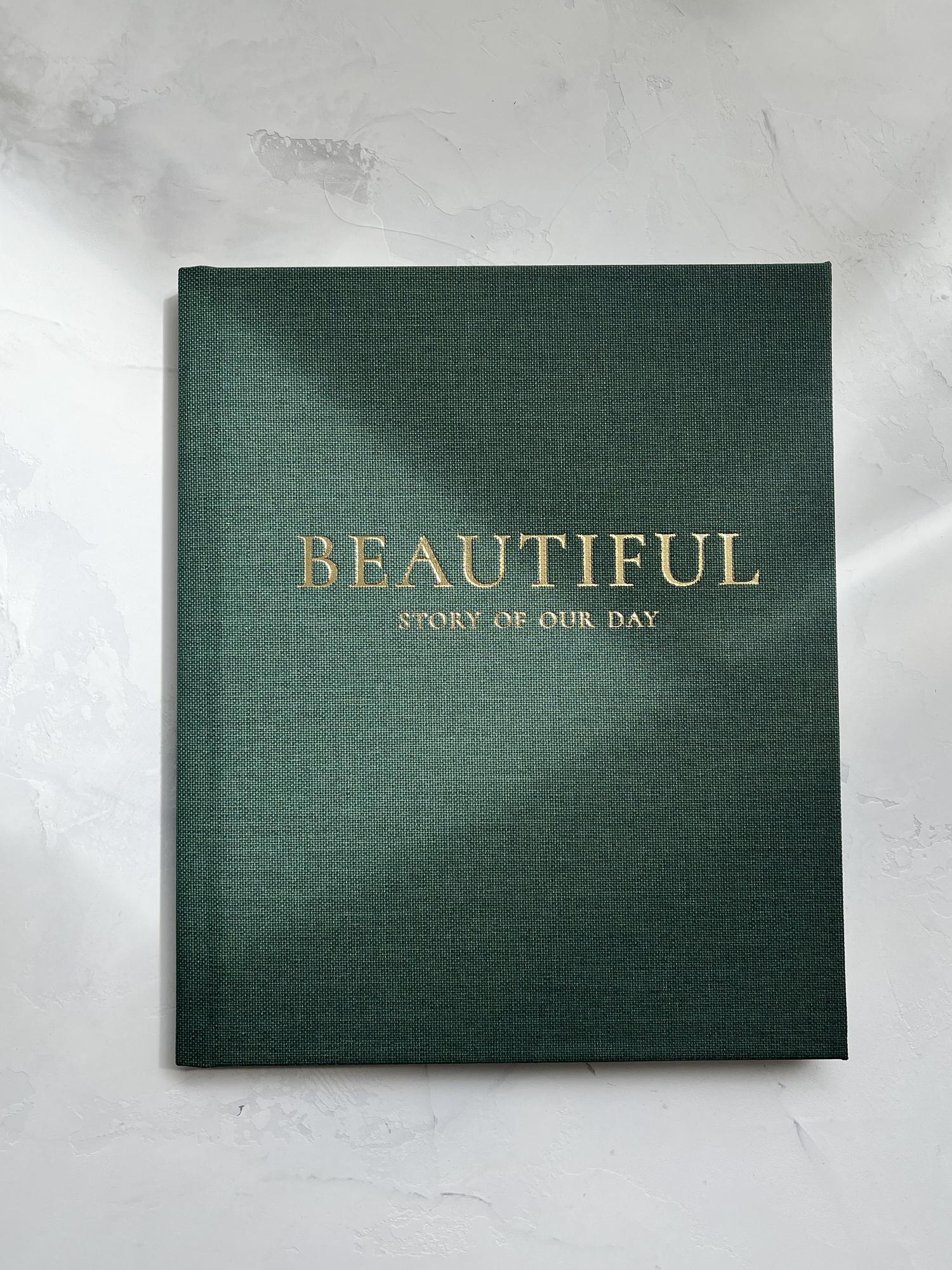 ФОТОКНИГА В ТЕКСТИЛЕ ТЕМНО ЗЕЛЕНОГО ОТТЕНКА 21х25 СМ