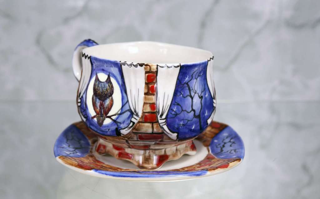 Handmade porcelain tea cup and saucer “Owl. Night"