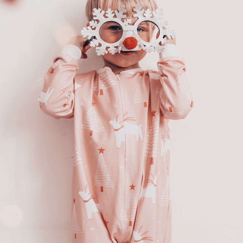 Deer and Christmas trees pajamas with a zip