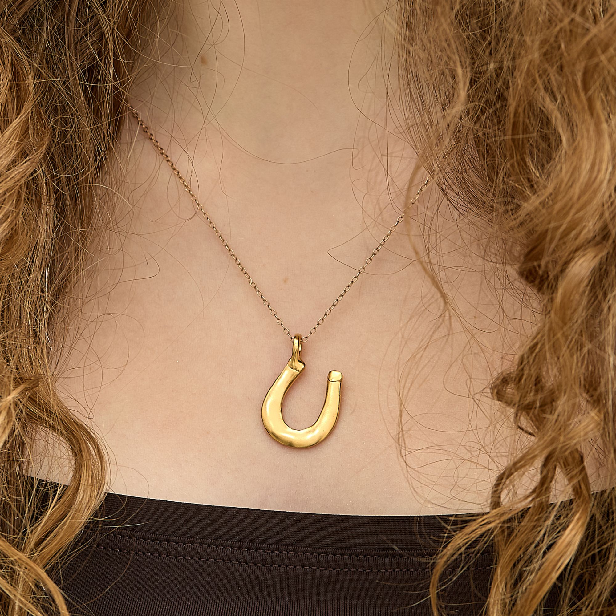 Sasha Gunga Подвеска в виде подковы в позолоте