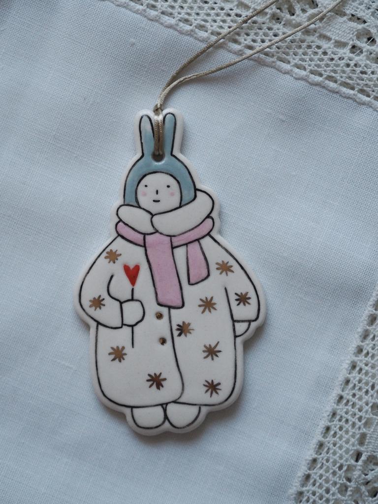 Мальчик-зайчик с золотыми снежинками