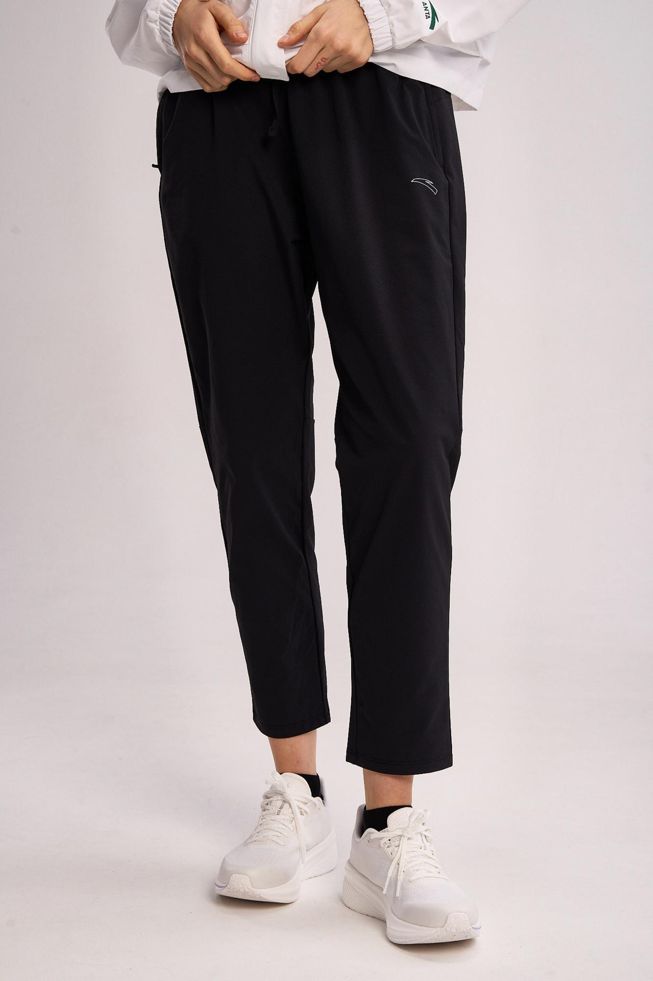 БРЮКИ ТЕКСТИЛЬНЫЕ ANTA RUNNING WOVEN TRACK PANTS