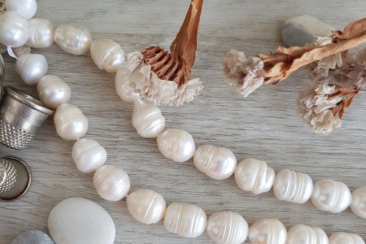 Жемчуг натуральный речной, перламутровый. Размер 11*9 мм