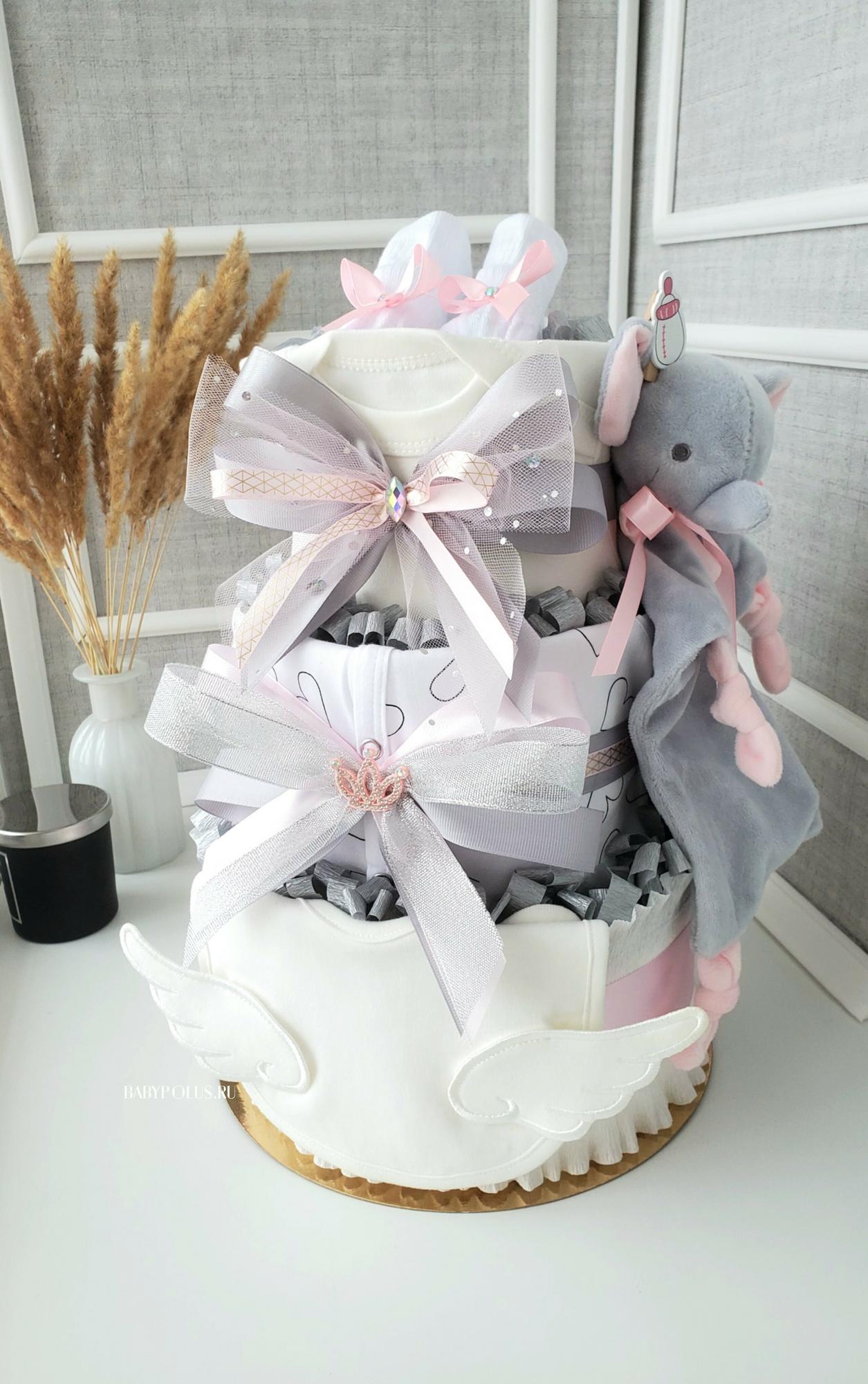 Торт из памперсов для девочки с комфортером "Ангел"