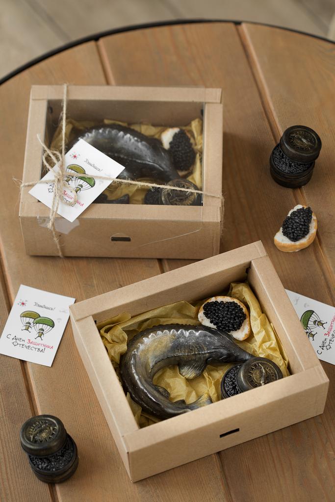 Осетр с черной икрой