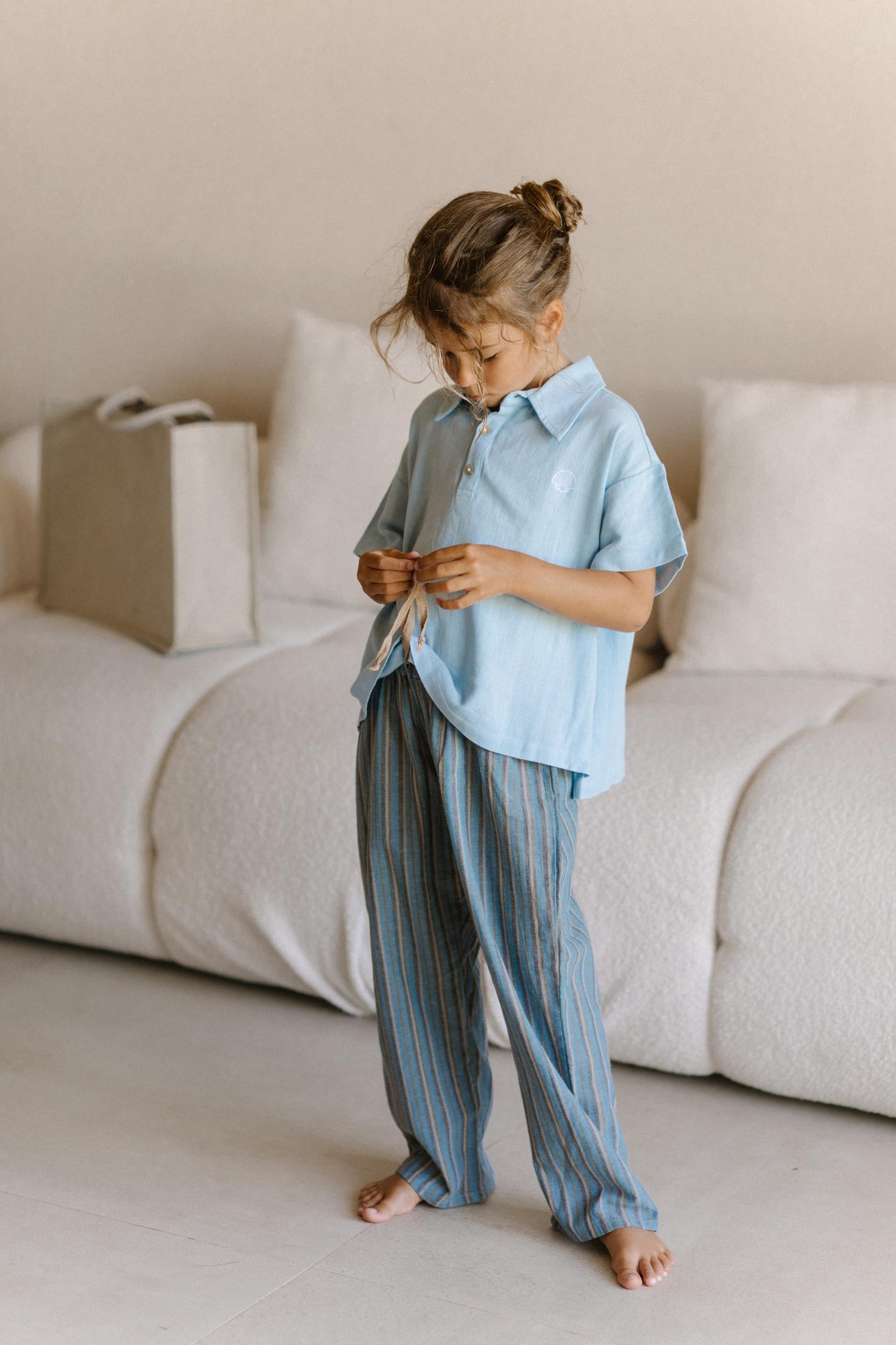 Брюки в полоску синие