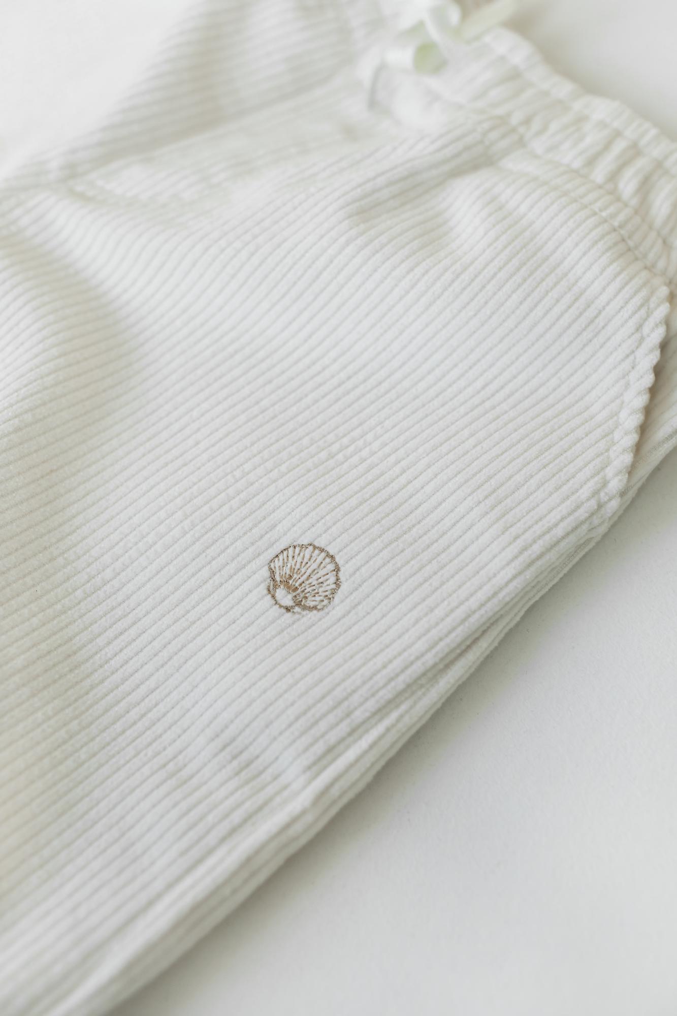 Вельветовые штаны молочные