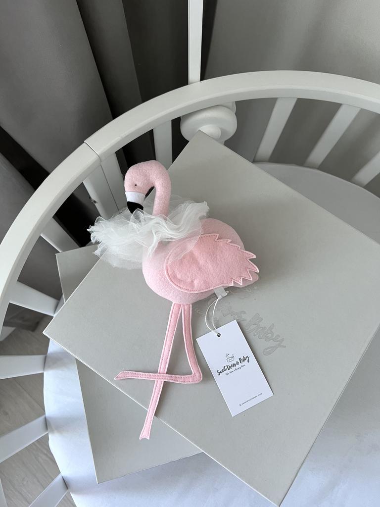 Игрушка фламинго.