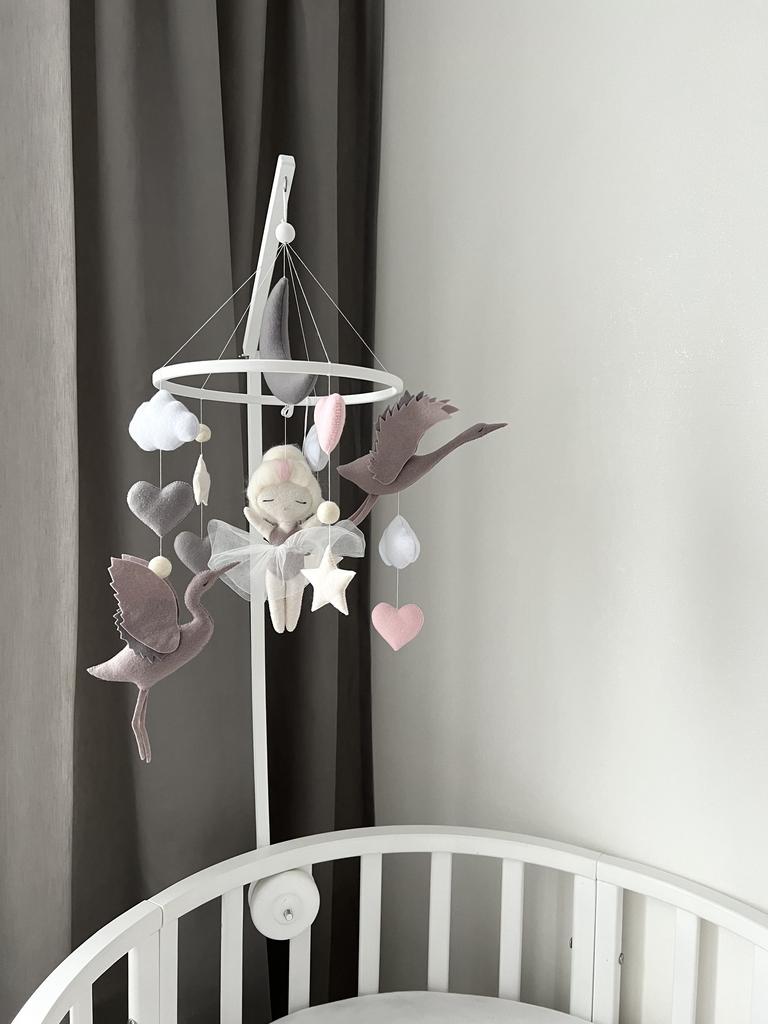 Мобиль с балериной, луной и двумя журавлями.