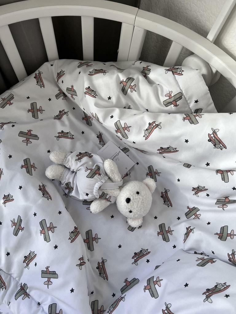 Мишка из пушистого велюра, имеющего фактурную текстуру букле или барашка.