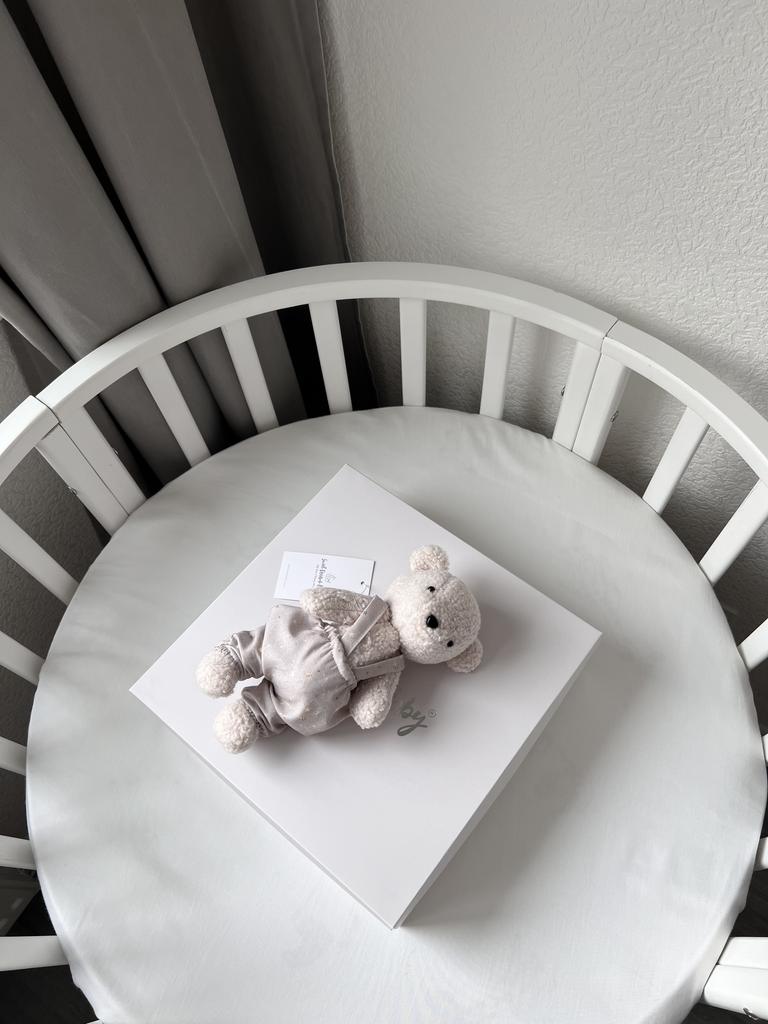 Мишка из пушистого велюра, имеющего фактурную текстуру букле или барашка в бежево - розовом цвете.