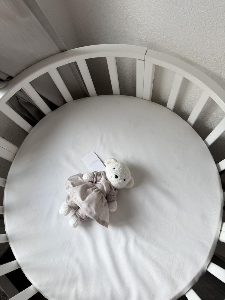 Мишка из пушистого велюра, имеющего фактурную текстуру букле или барашка в платьице и штанишках.