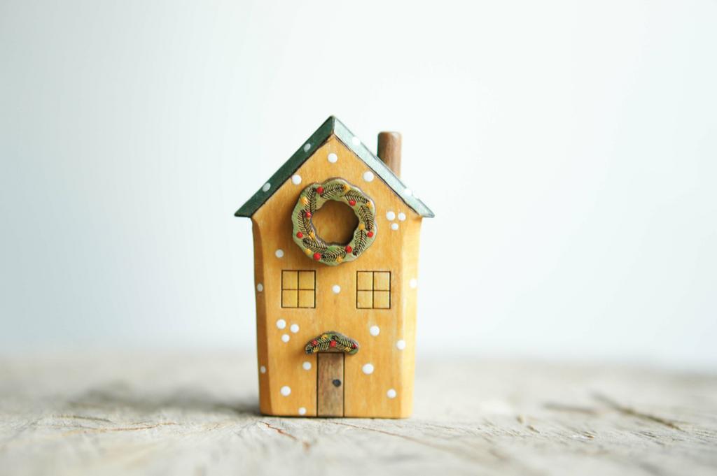 House wooden toy with snowflakes (painted yellow)