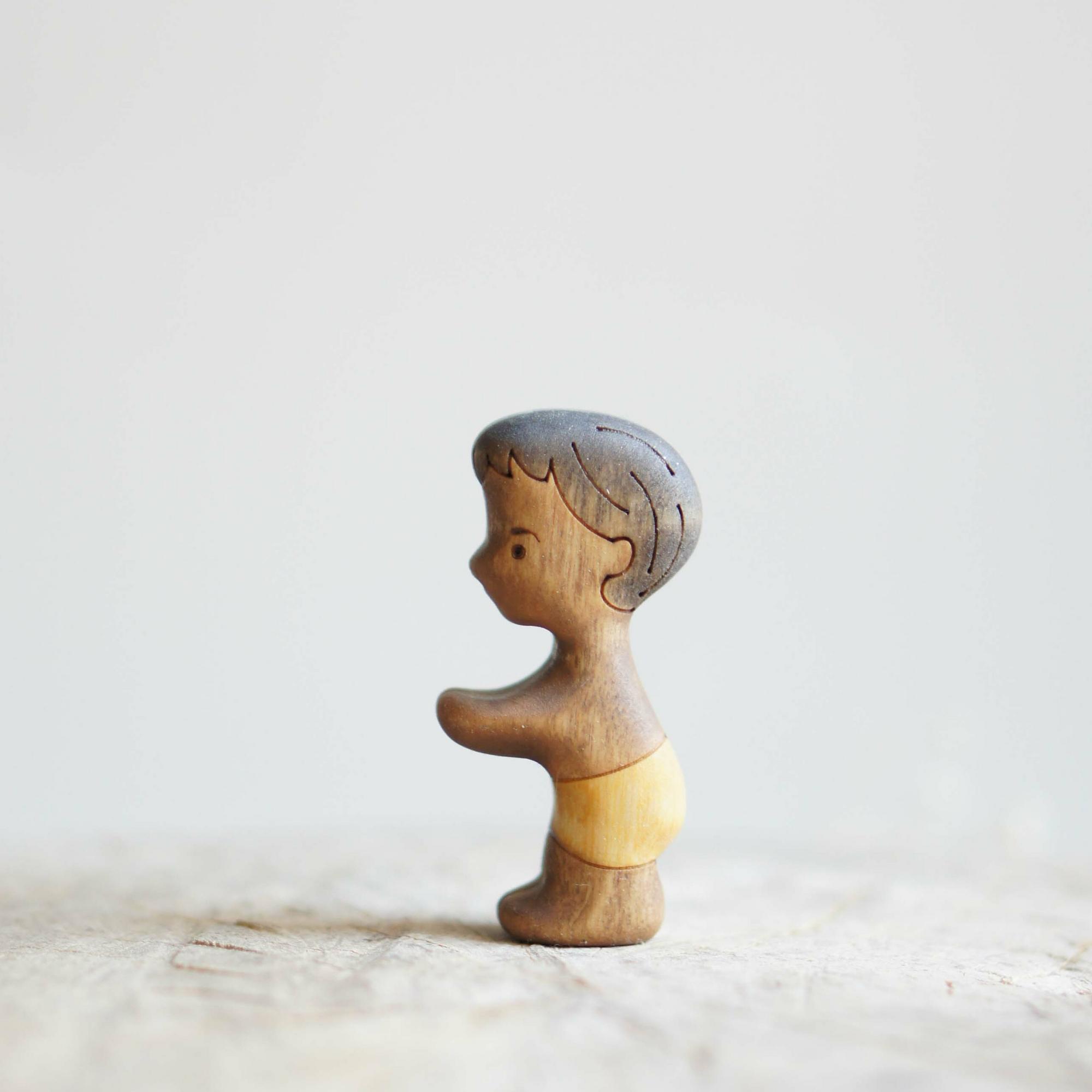 Boy older wooden toy (dark skin)