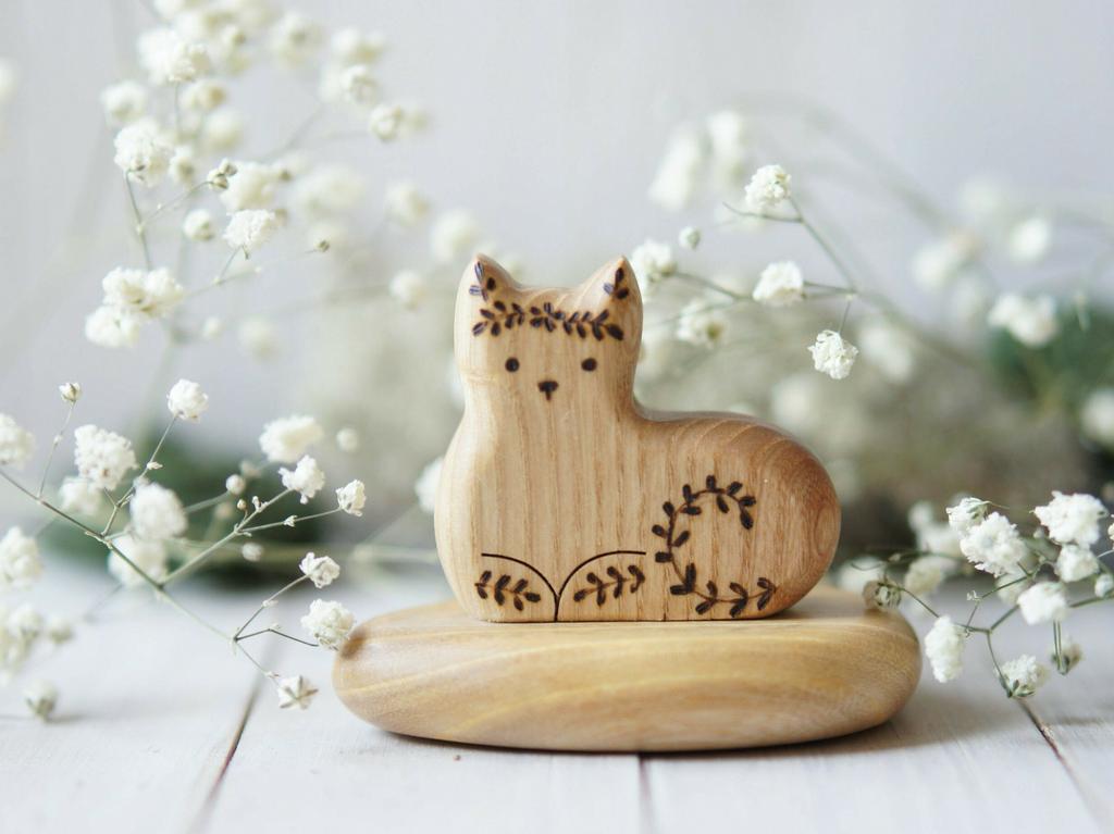 Cat lying  wooden toy