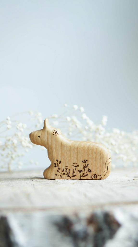 Wooden cow (lying ) toy natural