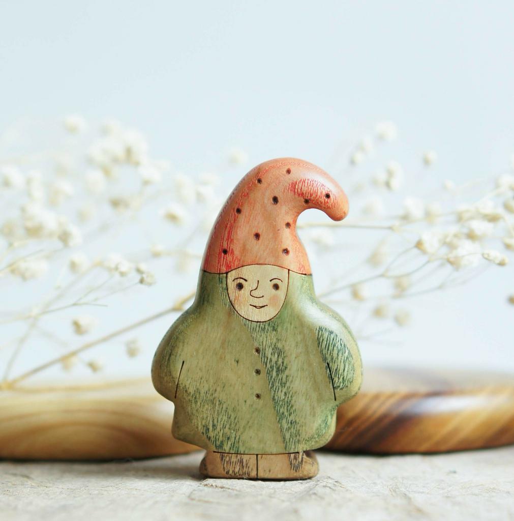 Wooden gnome dad toy.