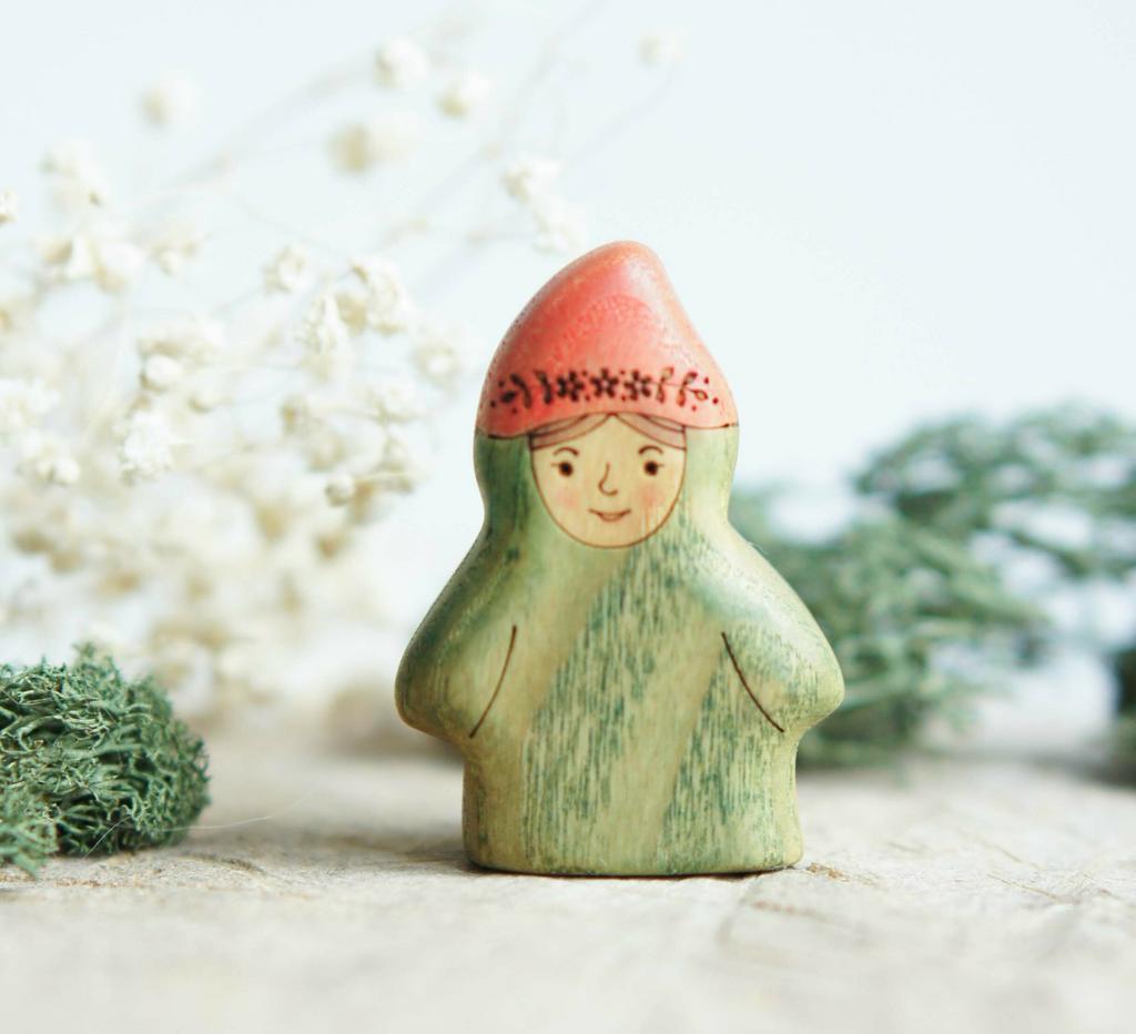 Wooden gnome girl toy.