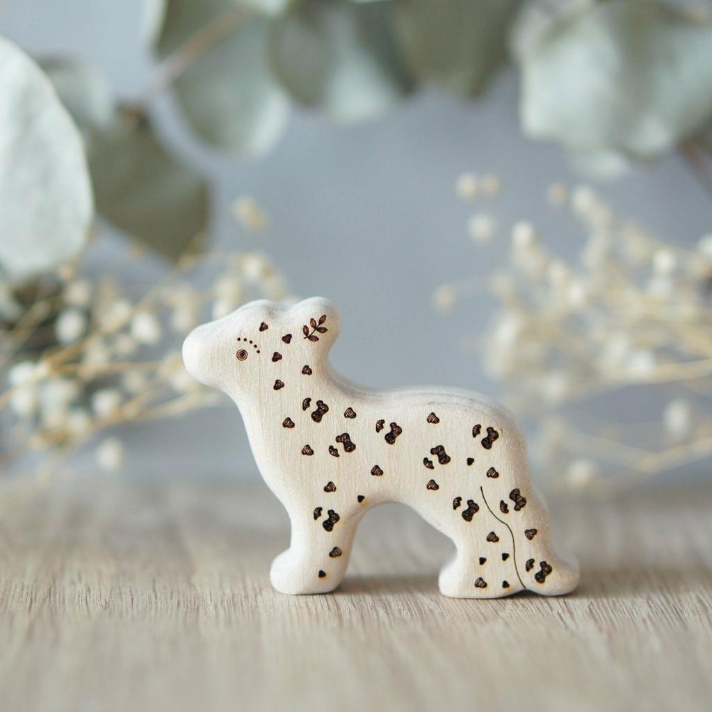 Wooden snow leopard baby toy  (with sparkle)
