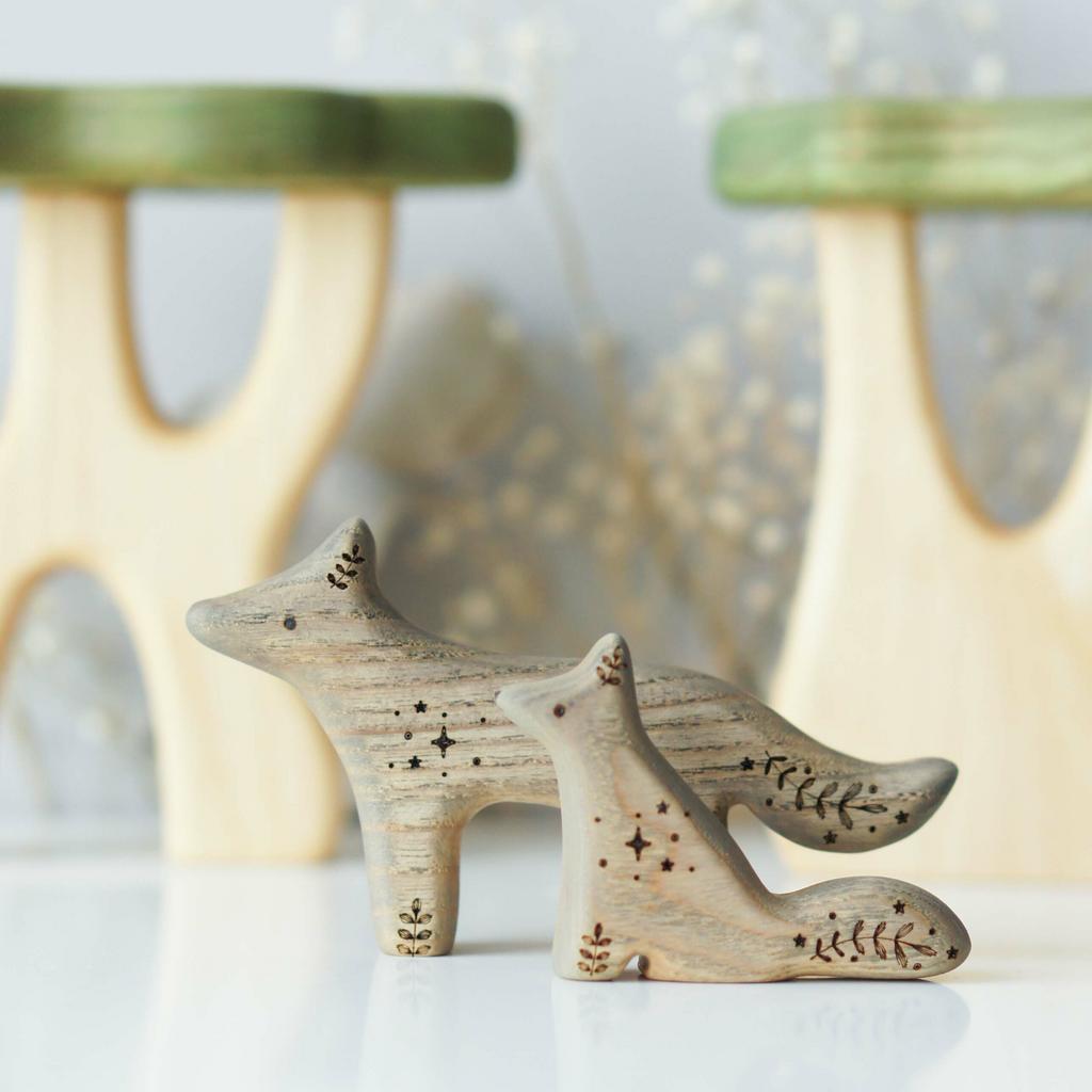 Wolf baby sitting wooden toy (colored)