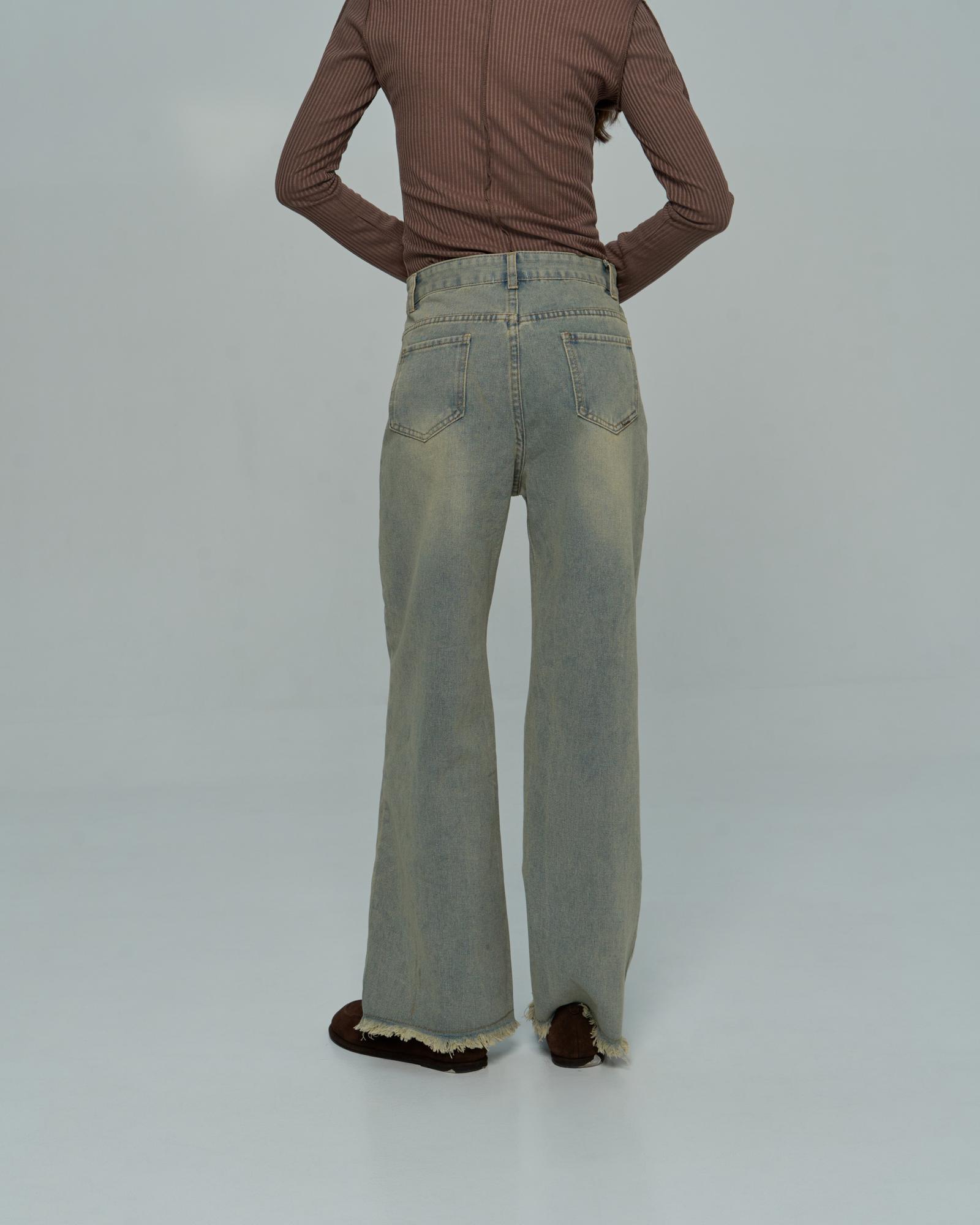 Джинсы зеленые