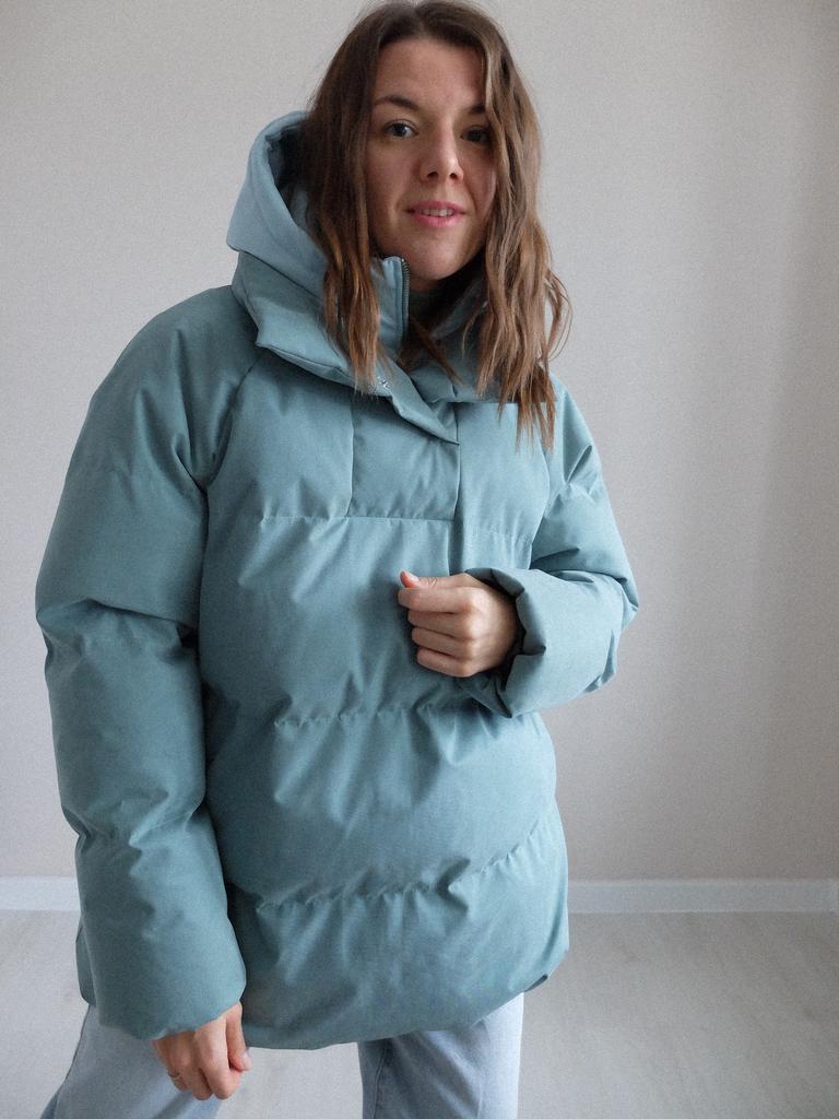 Видеопроцесс пошива пуховика УМА