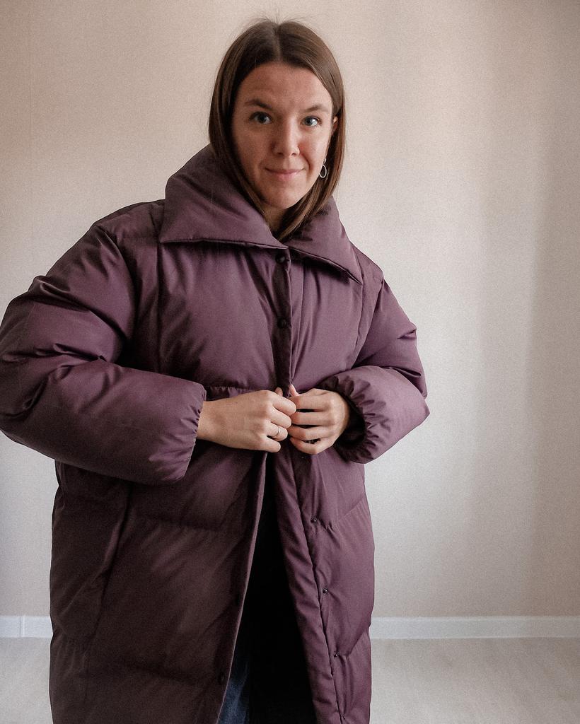 Видеопроцесс пошива пуховика НУРИТ