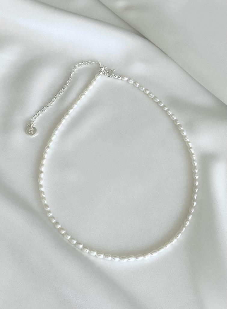 Necklace with small white rice pearls