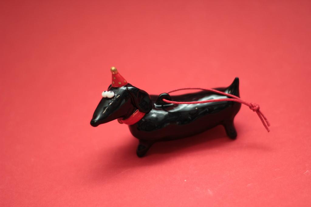 Такса в колпачке