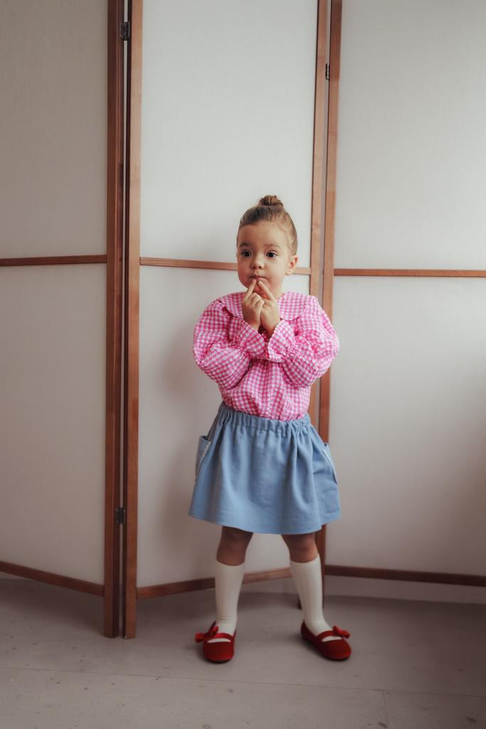 Блузка в розовую клетку