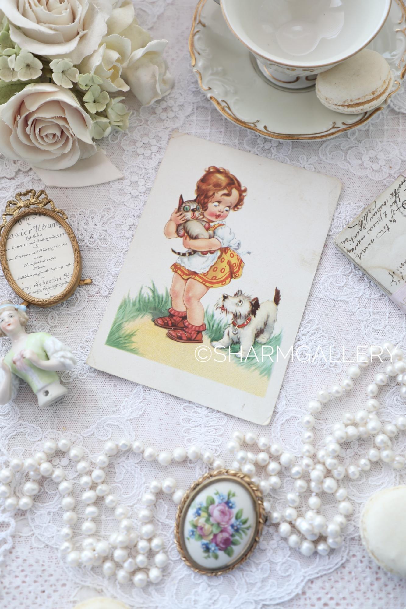 Старинная открытка №228 «Девочка спасает котенка» серия Дети, чистая. Германия