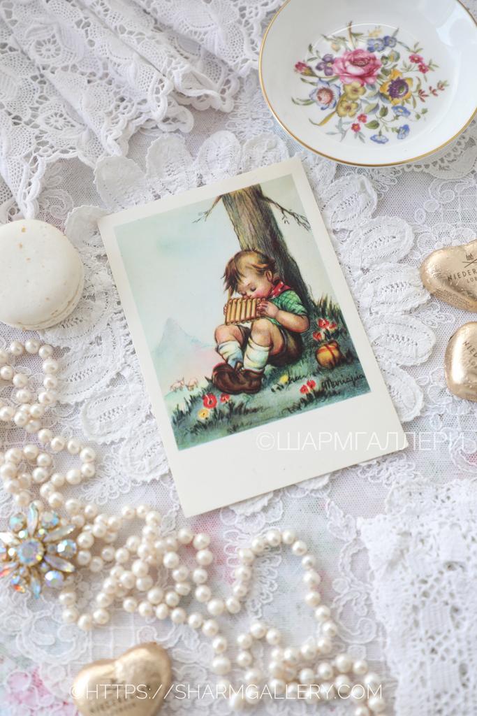 Антикварная открытка «Мальчик с губной гармошкой» M.I. Hummel  №286 чистая.