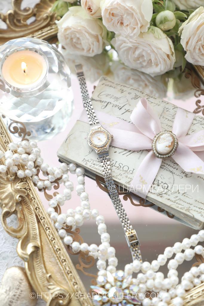 Наручные женские часы «Omax» кварцевые, металл. Швейцария.